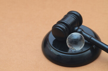 a judge's gavel serves as a powerful metaphor for legal decisions on climate change and international regulations.