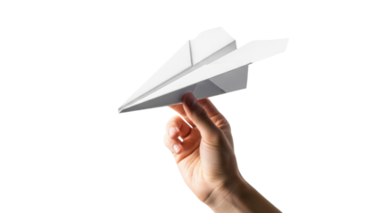 Hand launching white paper airplane on black background