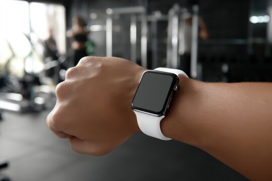 Smartwatch with White Screen Mockup Worn in Gym