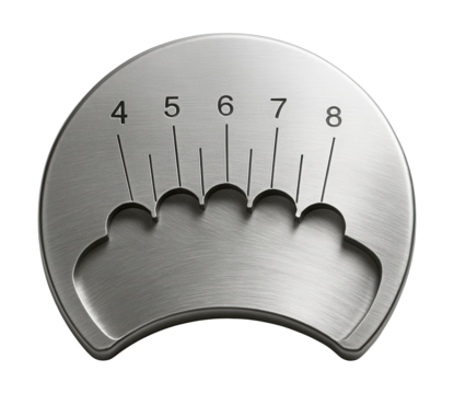 Metal lens curvature guide with engraved measurements for optical professionals.