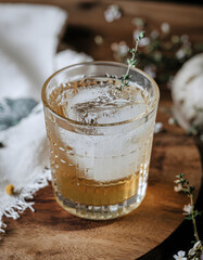 Refreshing drinks being poured into glasses on a table