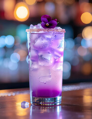 Refreshing cocktail with ice lime and fruit in a glass