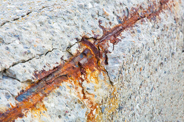 Old reinforced cracked concrete structure with damaged with rust