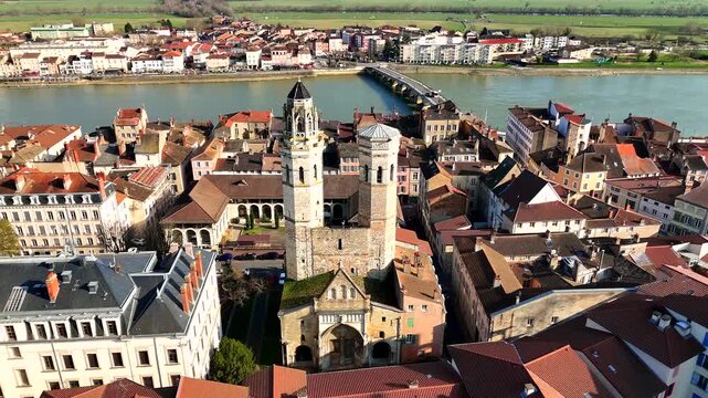 Romanesque twin towers of Saint Vincent Cathedral in Macon France at midday