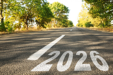 Obraz premium New 2026 Year. Numbers written on asphalt road