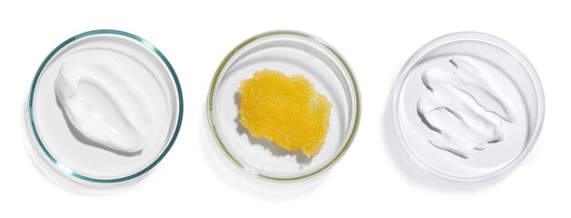 Petri dishes with cosmetic products on white background, top view