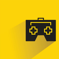 game joystick with shadow on yellow background