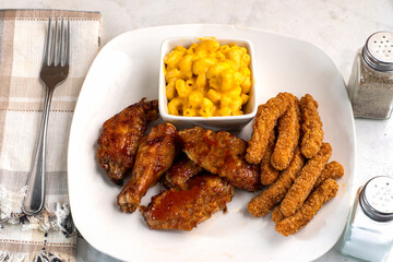 chicken wings and drumsticks with chicken fries