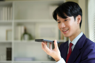 Businessperson using AI Agent virtual assistant with voice waveform interface. Concept of artificial intelligence support, voice bot, smart customer service, and virtual assistant automation.