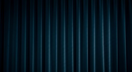 Fototapeta premium Dark blue vertical fabric backdrop with textured folds and shadows