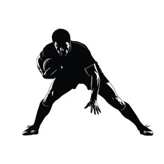Fototapeta premium Silhouette of a rugby player in action holding a ball ready to pass or run forward quickly