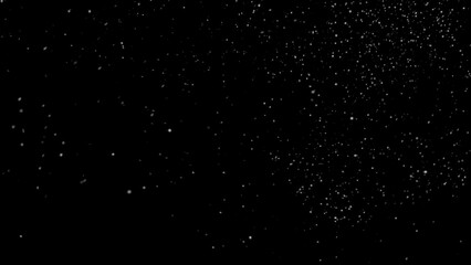 White particles creating a dynamic abstract background on a dark backdrop