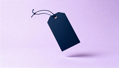 Minimalist black blank price tag with string on pastel lavender background