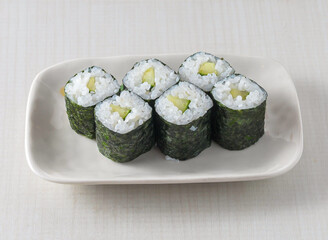 cucumber sushi rolls, a healthy and delicious option for your next meal. Perfect for vegetarian diets and Japanese cuisine promotions. Showcase fresh ingredients and culinary artistry.