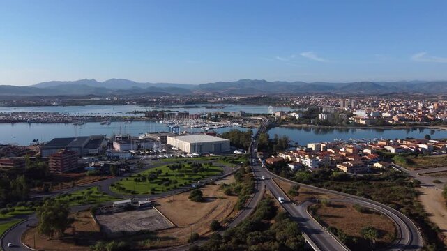 Strada Statale 125 Orientale Sarda Highway On The Coastal City Of Olbia In Sardinia, Italy. Aerial Drone Shot