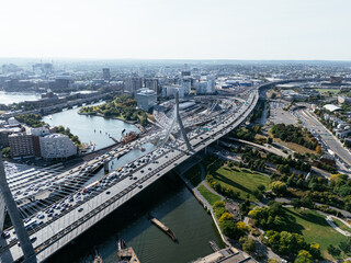 Obraz premium Aerial view of Boston city, bridges and river with skyline in sunlight. g.