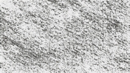 Black and white halftone pattern with distressed grunge texture, vintage retro style. Ideal as an artistic overlay, background for digital design, comic book effects, or print.