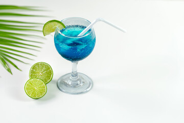 Blue Hawaiian Drink with lime, Blue hawaii cocktail on white  background
