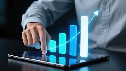 Man swiping tablet to view glowing bar chart rising in neon blue light, pricing analysis, market strategy