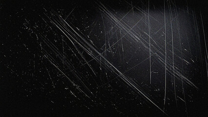 Dark grunge texture background with heavy white scratches and dust particles. Ideal for film overlays, vintage photography effects, retro designs, and creative digital projects.