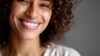 Joyful woman smiling indoor studio portrait photography calm atmosphere close-up happiness concept