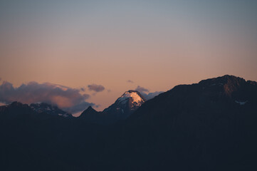 Alpenglow Sunrise on Mountain Peaks from Isthmus Peak, Wanaka, New Zealand