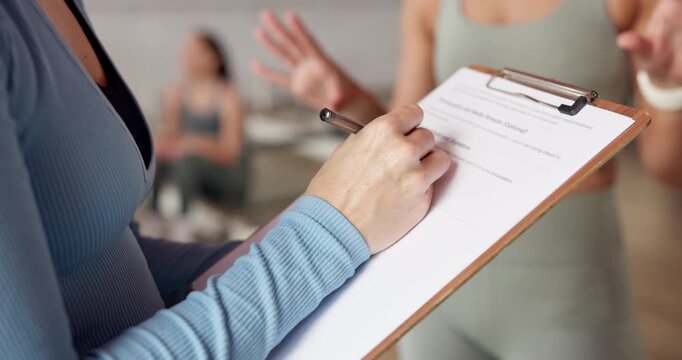 Writing, hands and clipboard for pilates membership with sign up, registration details or wellness. Women, client and instructor with paperwork in studio for application, explain contract and fitness