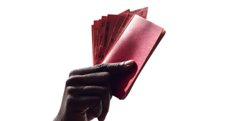 Hand holding a red card.