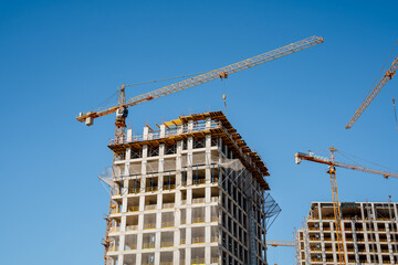 Construction of high-rise buildings with construction cranes. Moscow, Russia - 11 Sep 2025