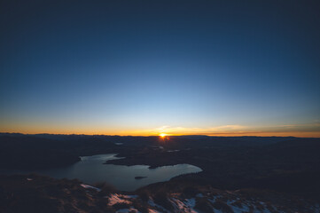 Sunrise Over Lake Wanaka from Roys Peak Summit in Early Autumn, New Zealand
