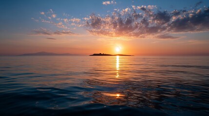 Fototapeta premium Sunset over calm waters with distant island view and colorful clouds in the sky