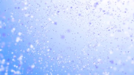 Blue purple particles floating creating abstract bokeh light