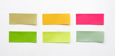 A set of fluorescent colorful rectangular paper sticker label isolated on white background. 