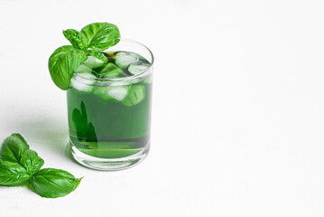 Liquid Chlorophyll Drink. Glass of Green Chrorophyll Water.
