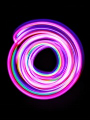 Neon spiral light painting art in vibrant colors