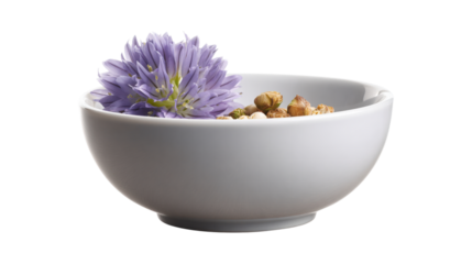A bowl of food with a flower on it isolated on a white background