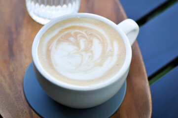 hot cofffee, cappuccino coffee or latte coffee or flat white and water