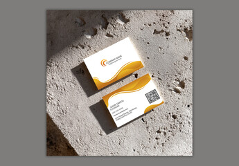 Stacked Business Cards Mockup on Concrete Background.