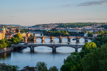 Close-up view of several bridges connecting parts of Old Town Prague, Czech Republic, illuminated by warm May evening sunlight- 1