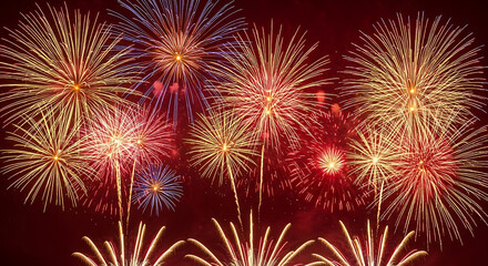 Naklejka premium Vibrant celebration fireworks display illuminating the night sky with explosions of light