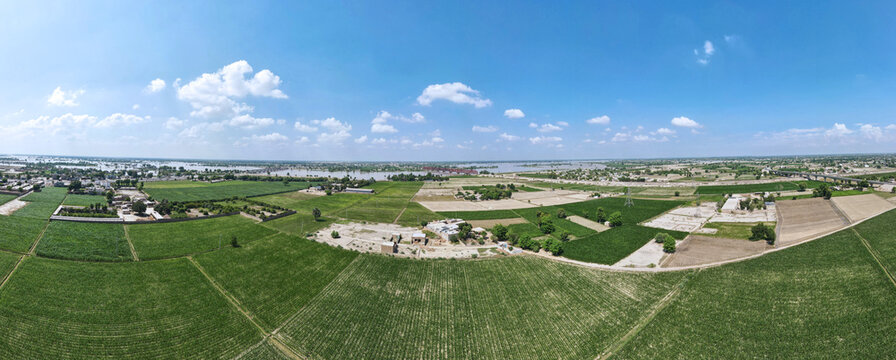 A 180-degree aerial panorama of agricultural fields and the Sutlej River, in Punjab, Pakistan
