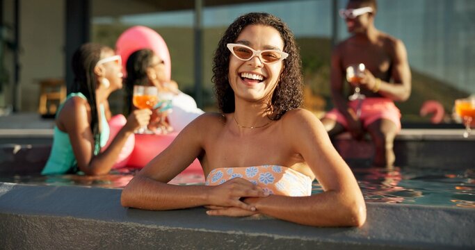 Happy, sunglasses and woman in pool at party at vacation house for break with friends. Smile, relax and female person swimming in water at luxury home on holiday at lodge, resort or hotel in summer. - Powered by Adobe