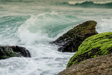 Beautiful seascape with waves breaking on the rocks. Nature background