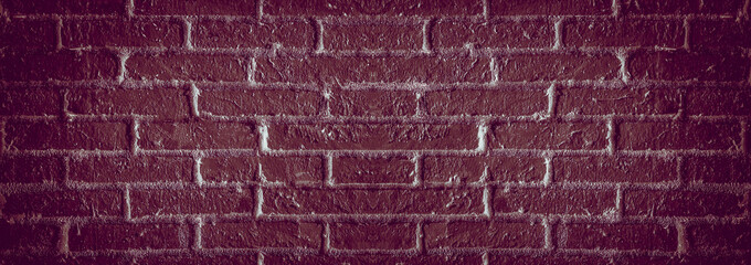 Dark red brick wall texture. Abstract grunge background and panoramic surface.