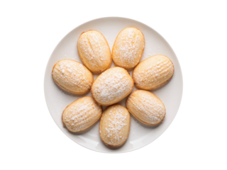 Flower-Shaped Madeleines Dust-Ed with Powdered Sugar on White Plate