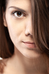 Fototapeta premium close up portrait of a brunette girl looking at camera.