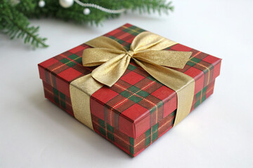Gift box with golden ribbon. Christmas gift box