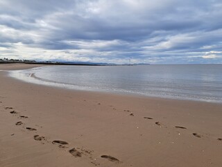 footprints on the beach