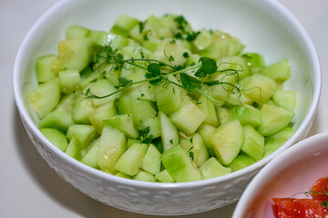 Cucumber salad on the table