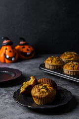 pumpkin muffins on a dark background